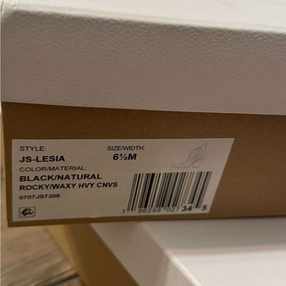 Black and white boots